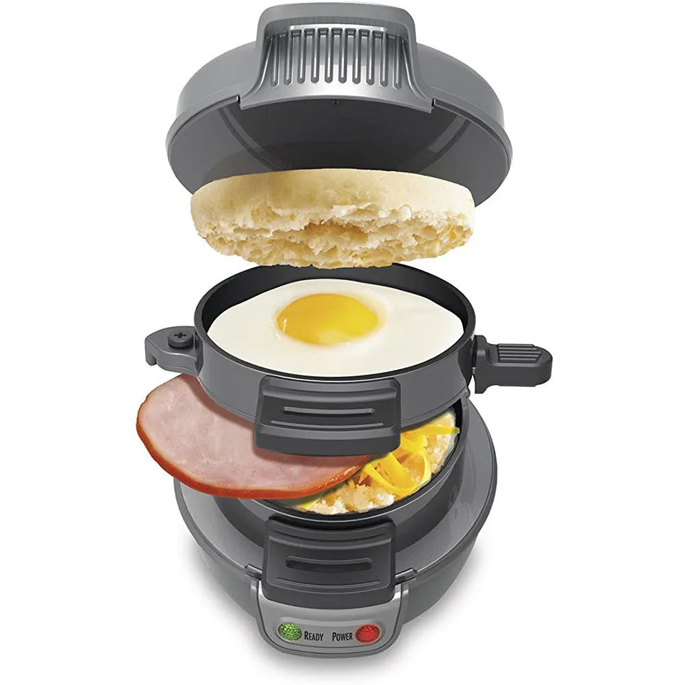 Bright red household breakfast machine with sandwich plates, egg cooker ring, and waffle plates on kitchen counter.