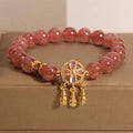 Women's strawberry quartz bracelet with four leaf clover dream catcher pendant charm