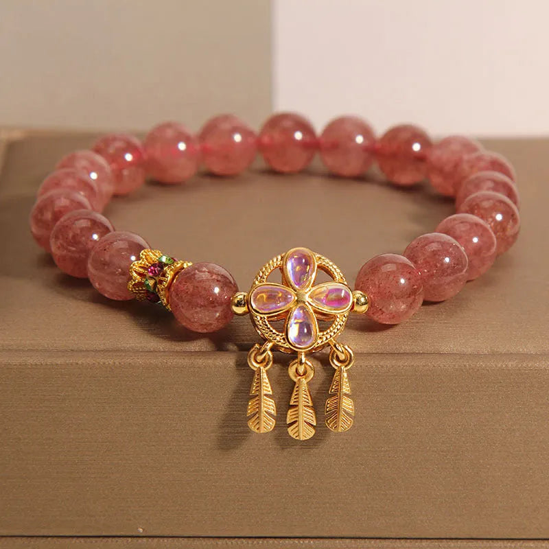Women's strawberry quartz bracelet with four leaf clover dream catcher pendant charm