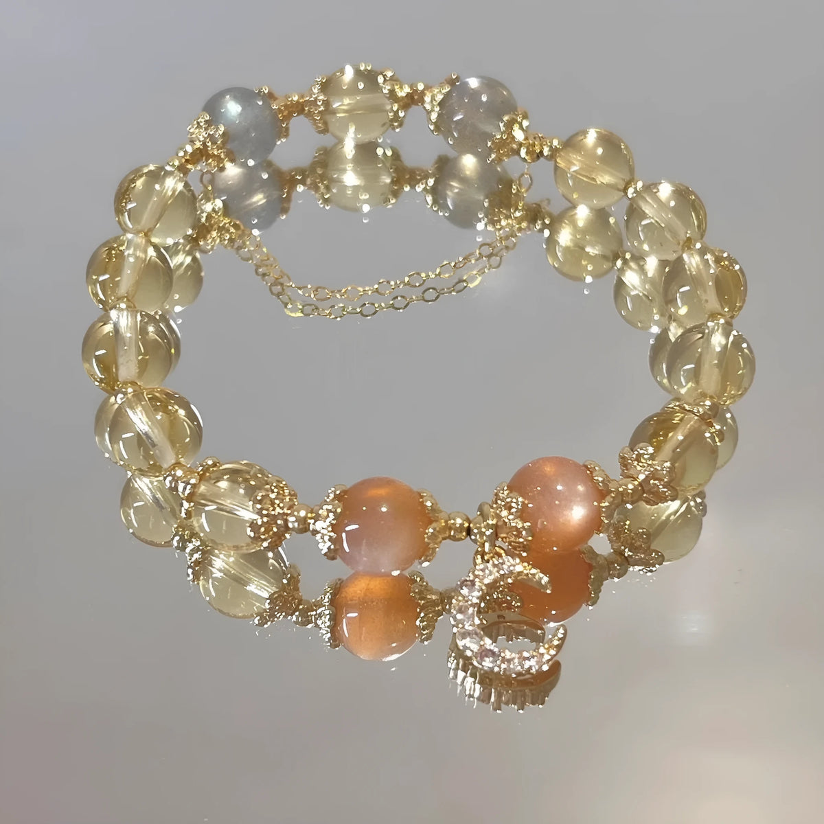 Women's Chinese style crystal bracelet with citrine moonstone and 14K gilded finish