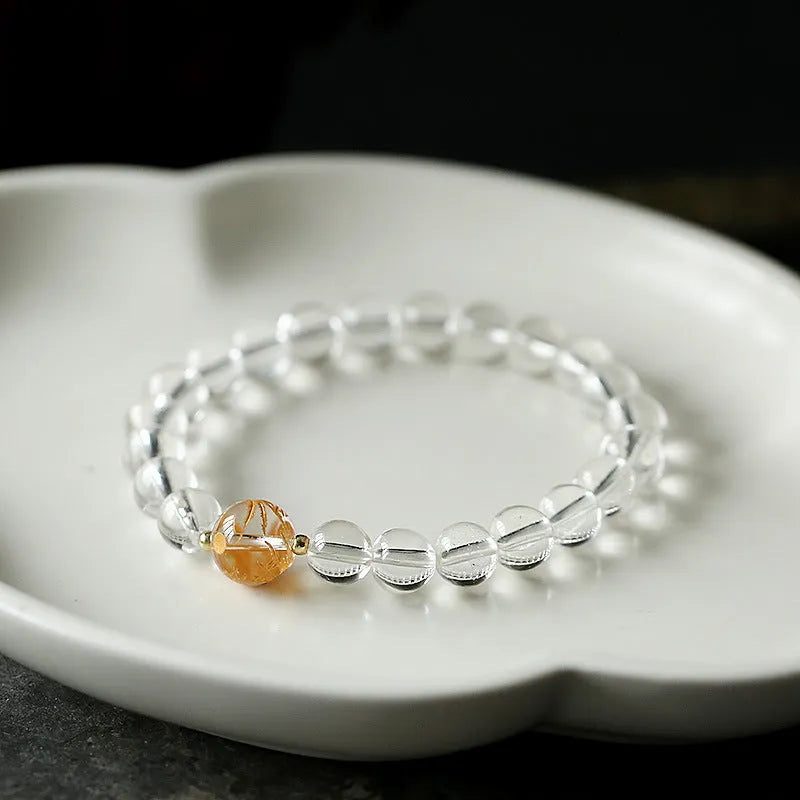 Geometric obsidian and white crystal beaded bracelet with gold dragon charm for 14-16cm wrist.