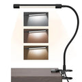Black and white USB-powered LED desk lamp with 26 cm length for study desks.