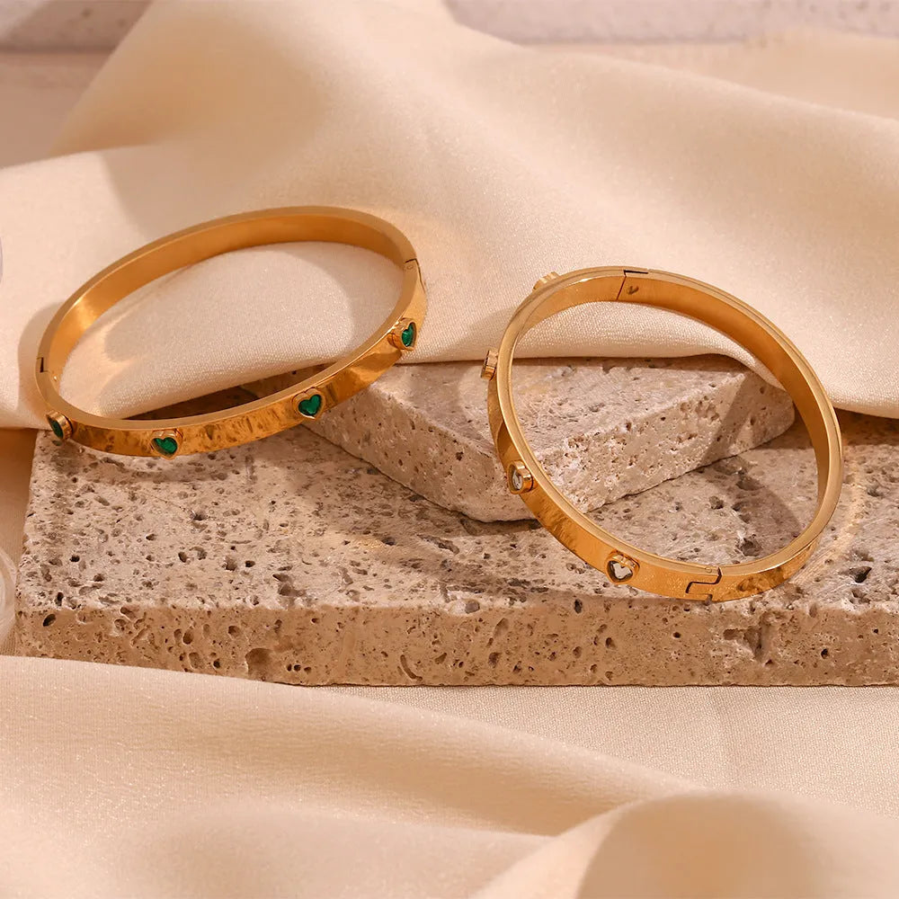 Golden electroplated stainless steel women's bracelet with micro-inlaid peach heart design