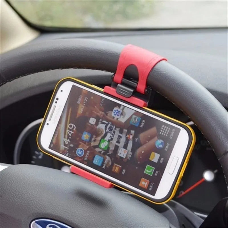 Black steering wheel phone mount with elastic clip and silicone padding for smartphones