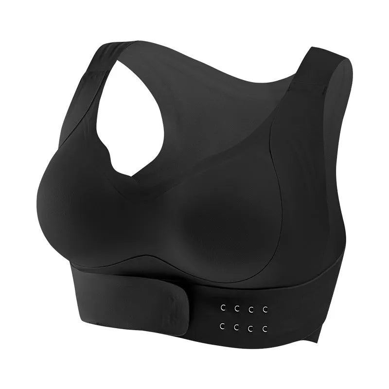 Women's black cross back yoga bra with front buckle closure on a mannequin.