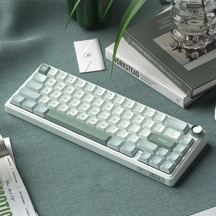 White wireless mechanical keyboard with RGB backlighting on a desk.