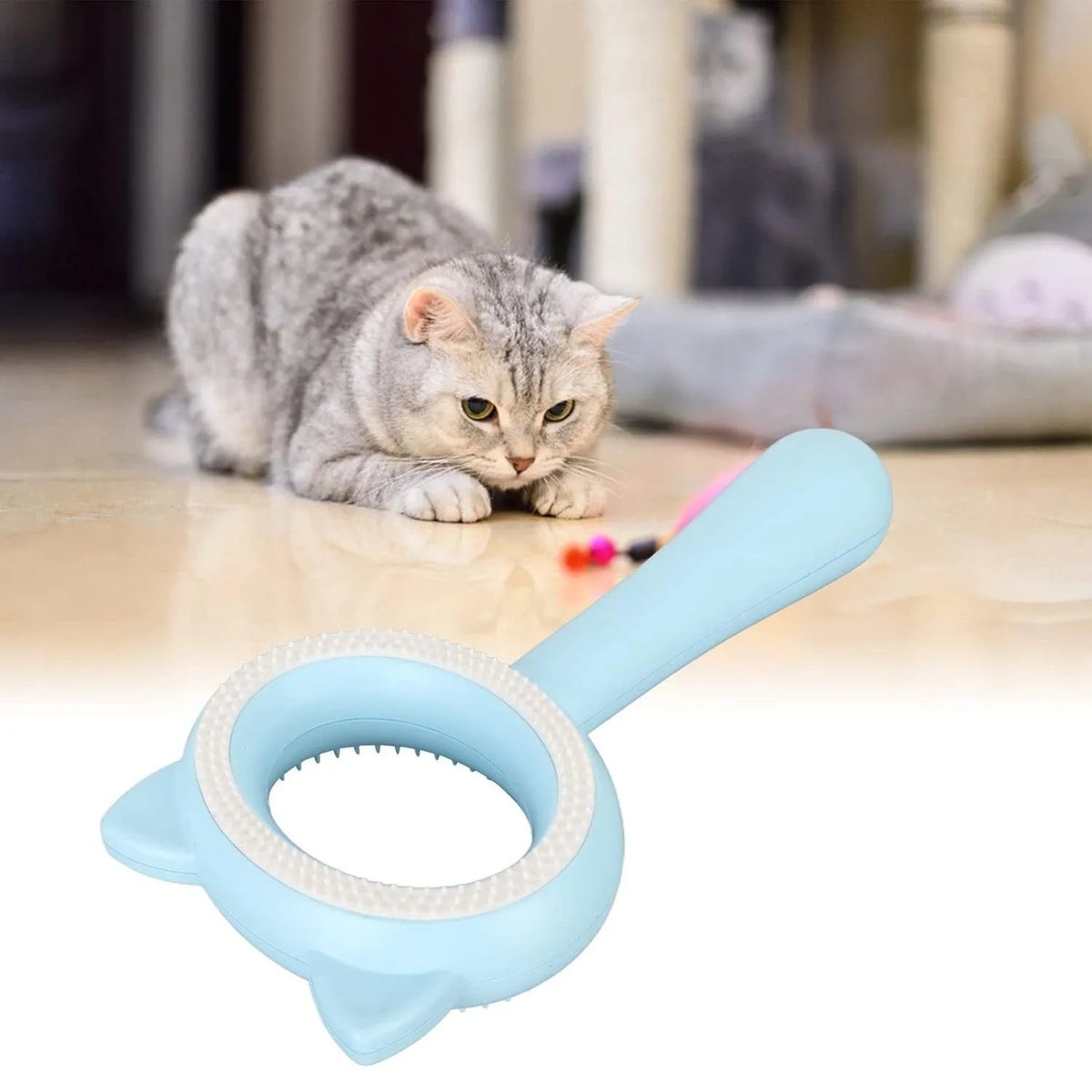 Blue and white double-sided pet grooming brush with ergonomic handle for cats and dogs