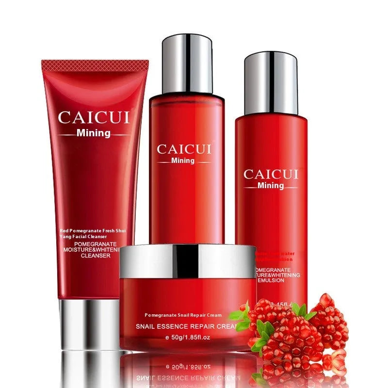 Pomegranate skincare set containing face wash, toner, lotion and facial cream in red packaging.