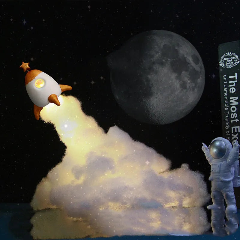 Astronaut rocket night light DIY kit components with LED string lights and rocket model