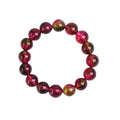 Women's handmade watermelon crystal bracelet on wrist, showing pastoral style and available bead sizes.