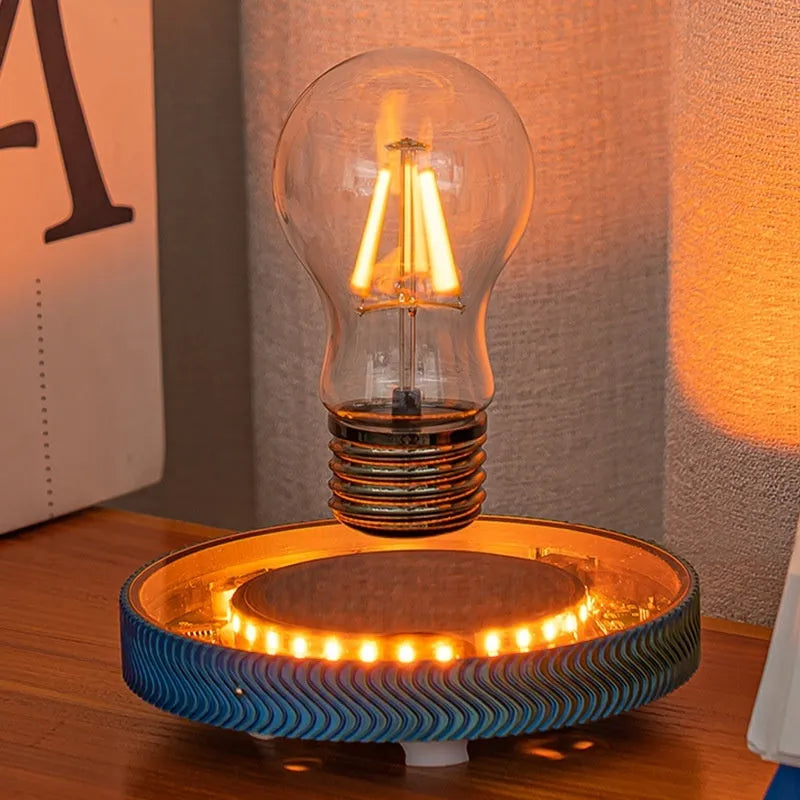 Magnetically levitating moon night lamp floating above its base on a desk