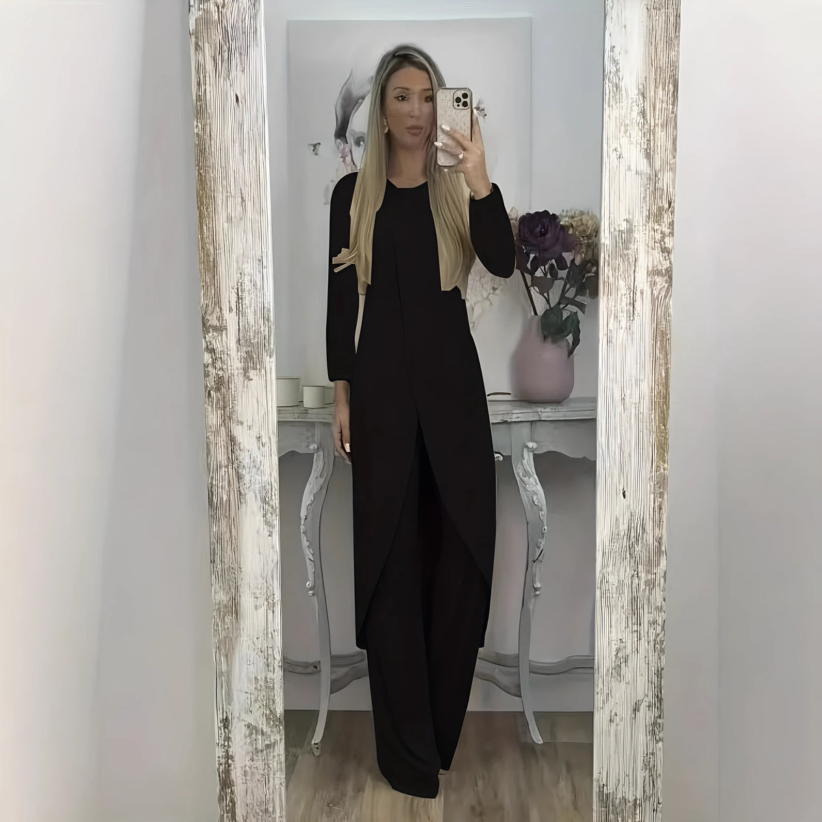 Polyester two-piece lounge set with long sleeves and loose trousers in black