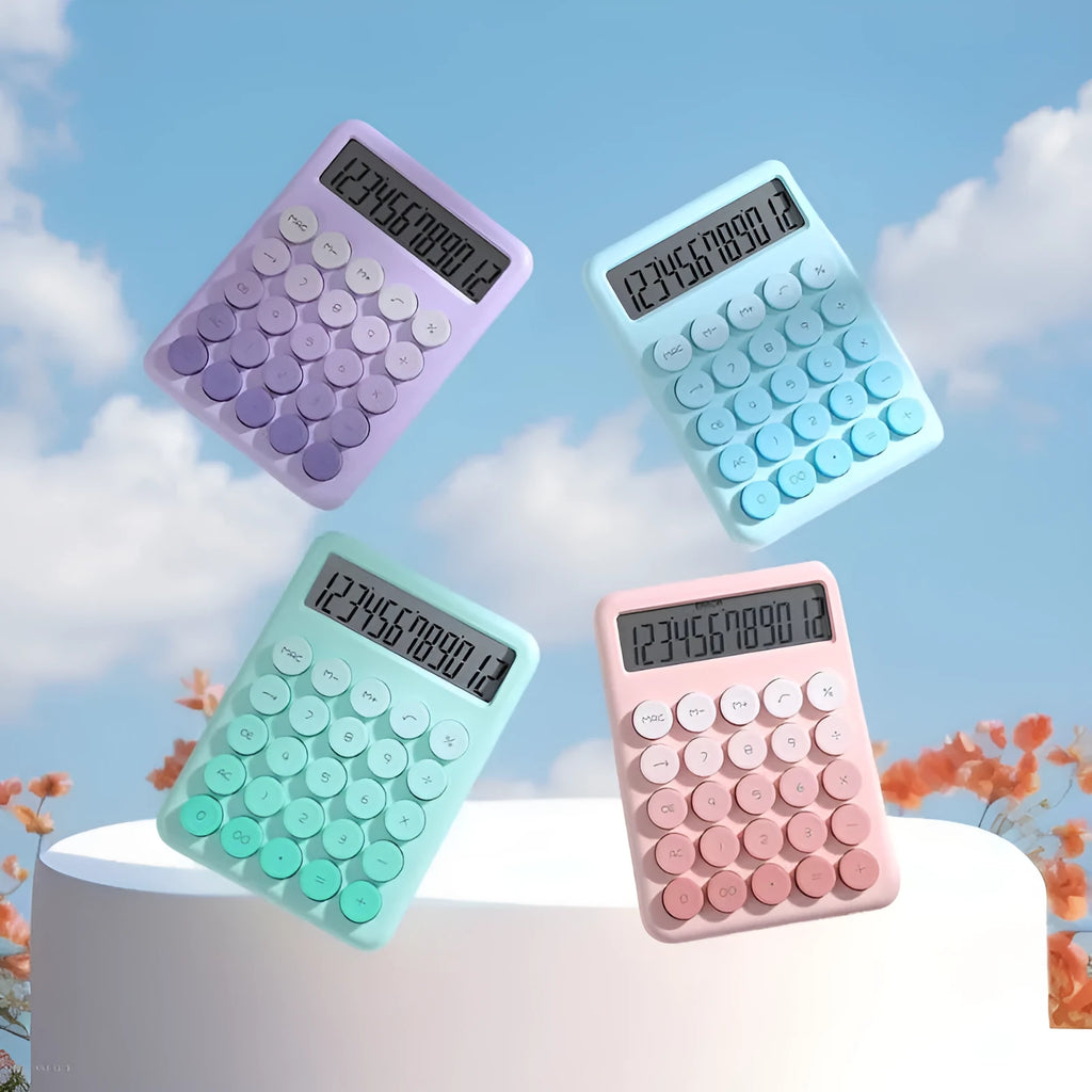 A gradient colour desktop calculator in violet, pink, blue, or green on a desk.