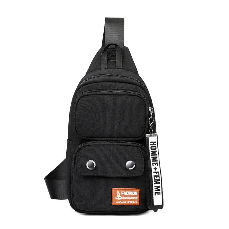Crossbody shoulder bag in nylon with polyester lining, showing storage compartments