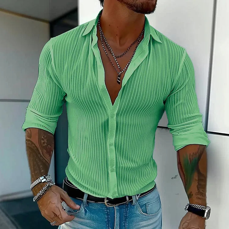 Man wearing a British-style striped cardigan with long sleeves and a loose fit