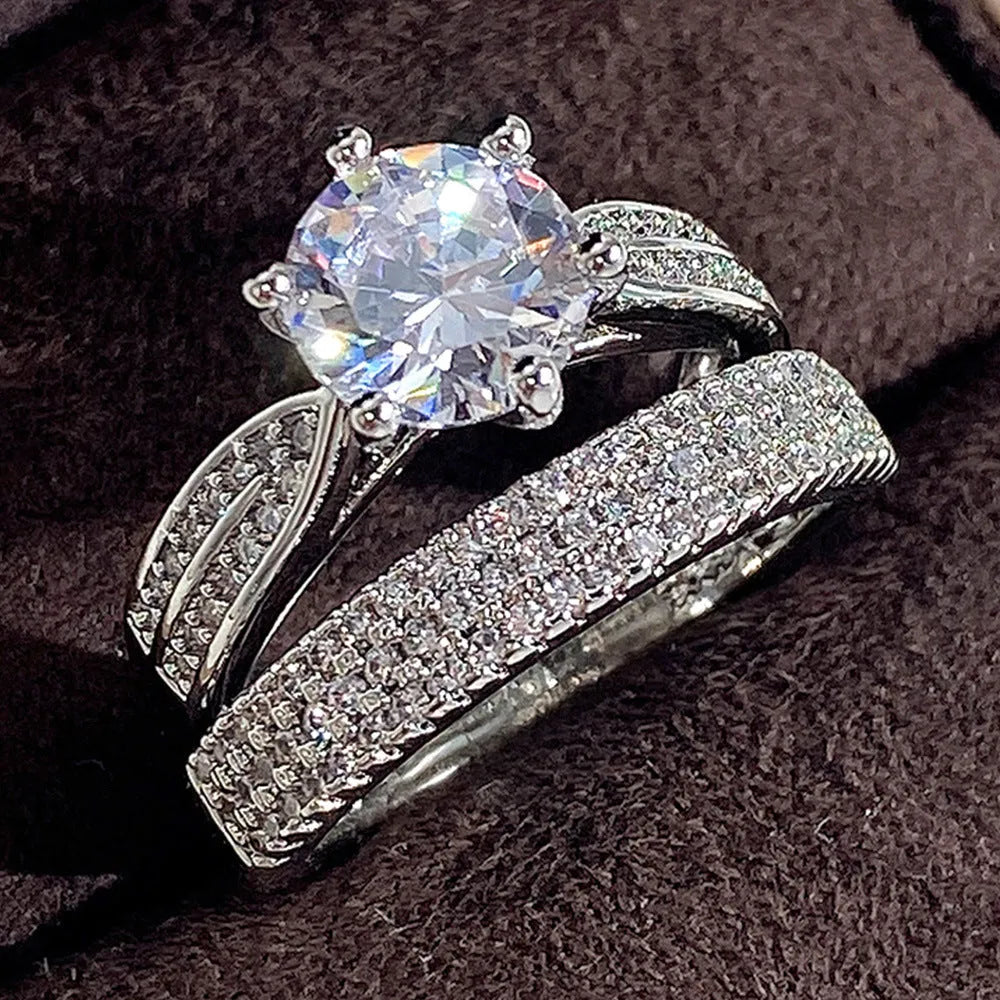 Geometric alloy wedding ring bracelet in white gold colour showing round design elements