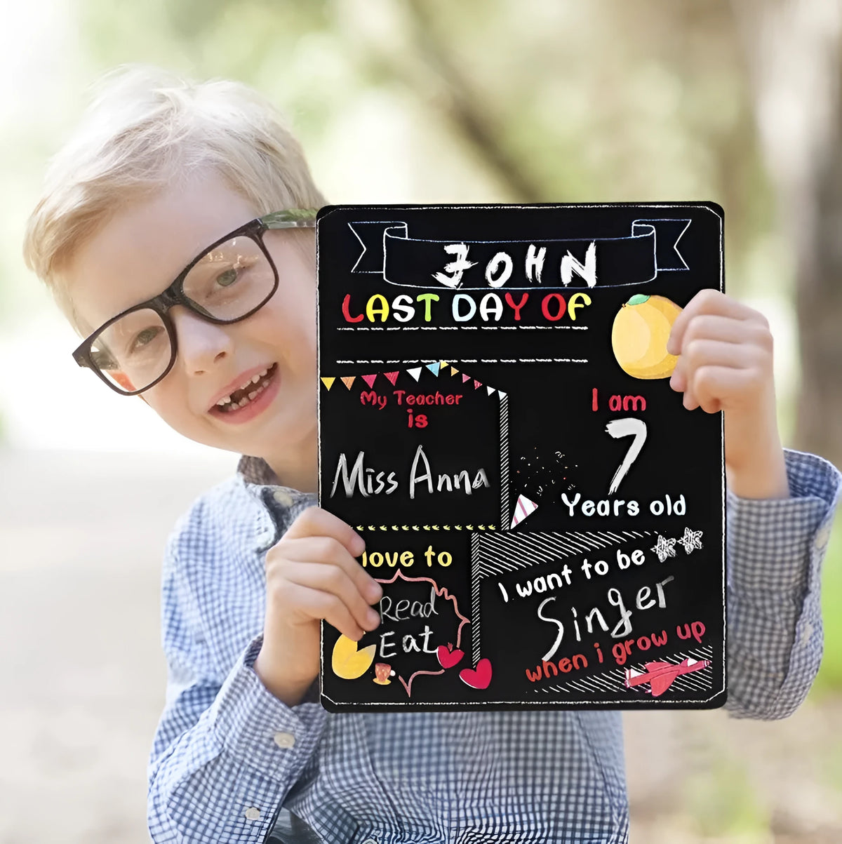 Wooden blackboard with first day of school design on density plate measuring 25.5 by 30 centimetres