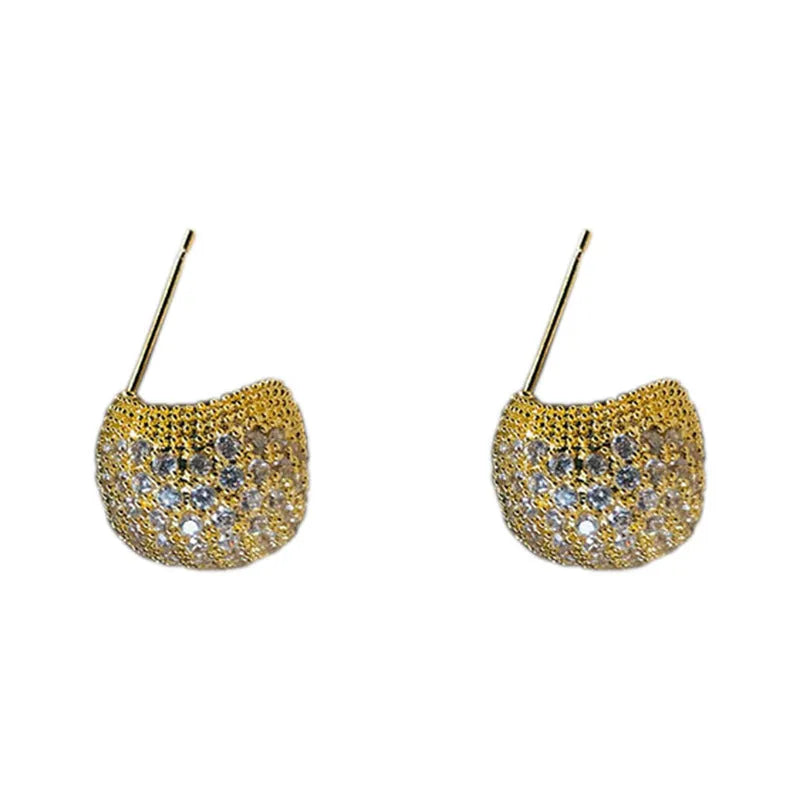 Gold and white women's drop earrings with geometric sphere and diamond-cut golden bean design