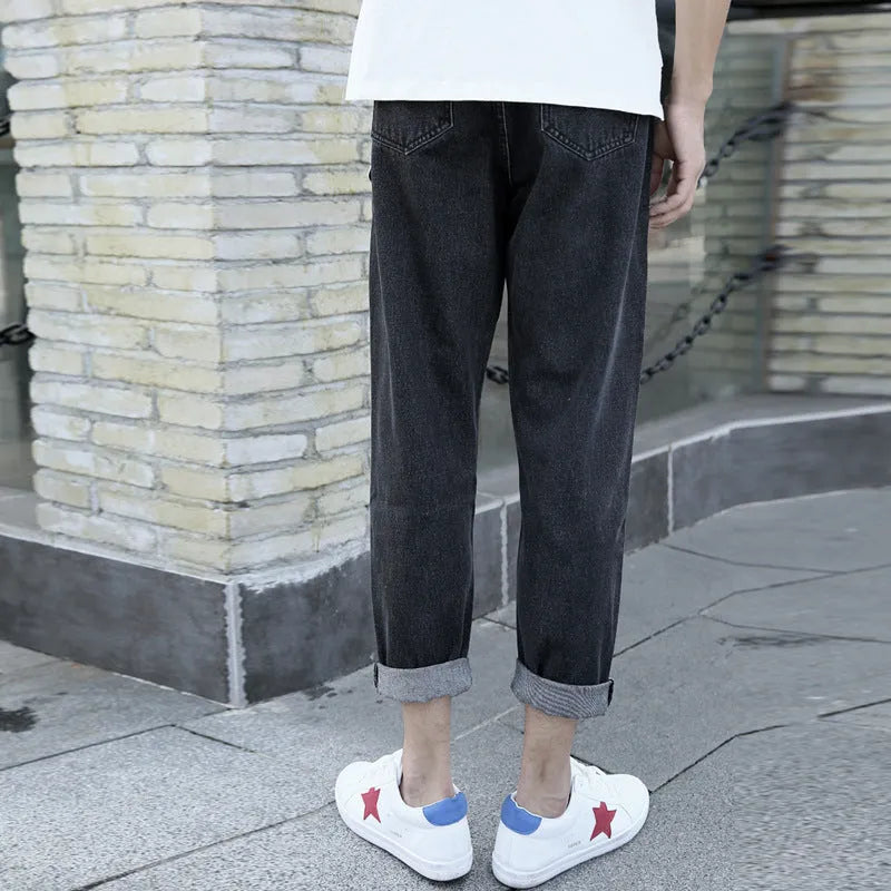 Men's loose straight harem jeans in black or blue with lightweight straight leg opening