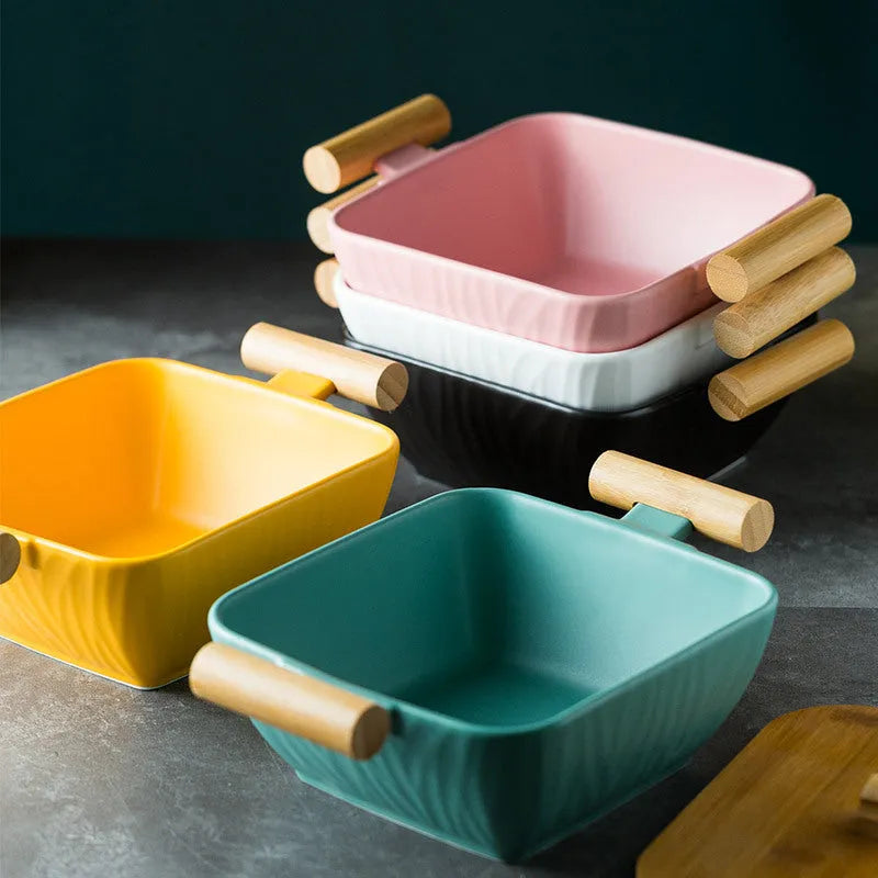 Irregular shaped ceramic bowl with matching lid in porcelain, shown in available colour options