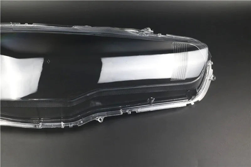 Transparent plastic headlight housing cover with 50mm×30mm×20mm dimensions for vehicle lamp replacement