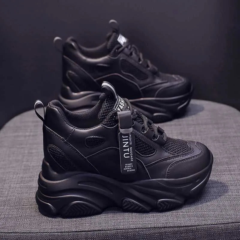 Women's black mesh platform casual shoes with an elastic toe holder and TPR sole