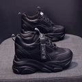 Women's black mesh platform casual shoes with an elastic toe holder and TPR sole