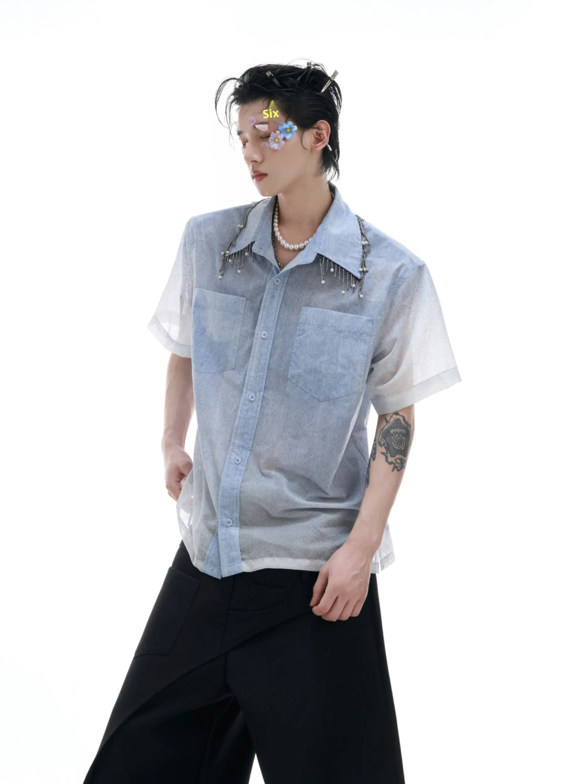 A loose-fitting men's blue to white gradient short-sleeve shirt for casual summer wear.