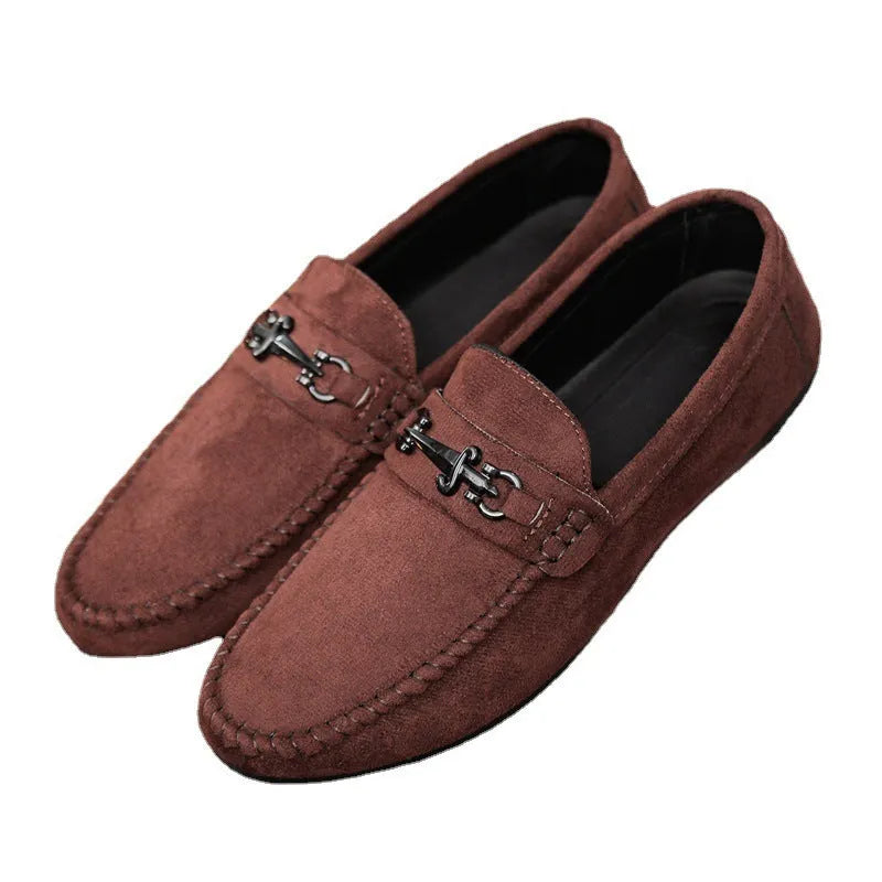 Men's waterproof black and brown slip-on loafers with round toe and low stiletto heel on a rubber sole.