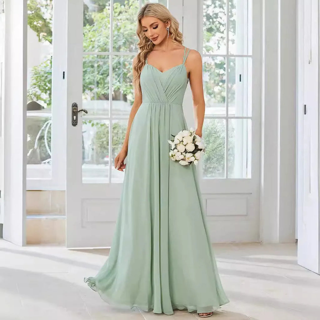 Women's long pleated A-line dress in polyester fabric, sleeveless design available in multiple colours