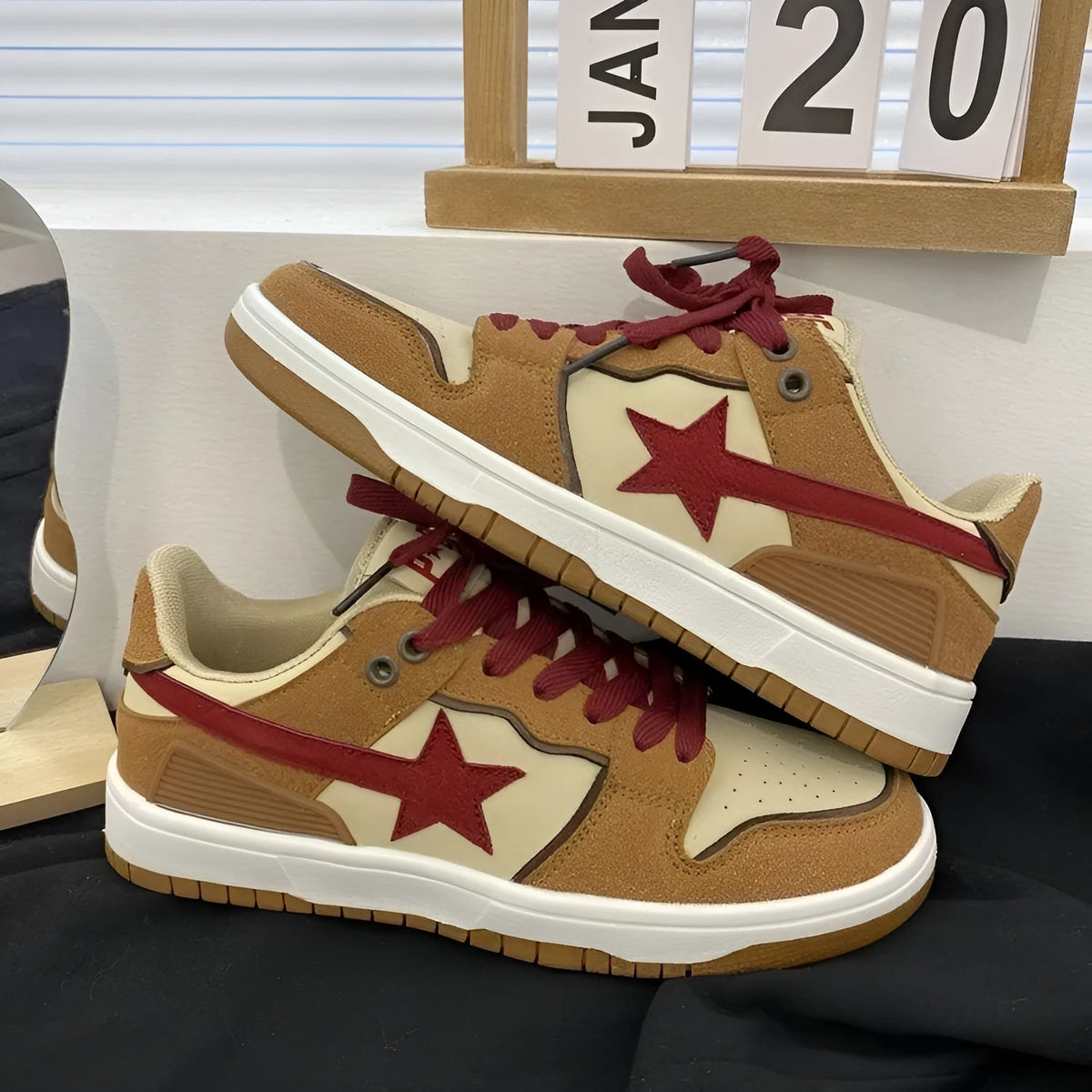 Women's brown platform sneakers with sequin accents and round toe design