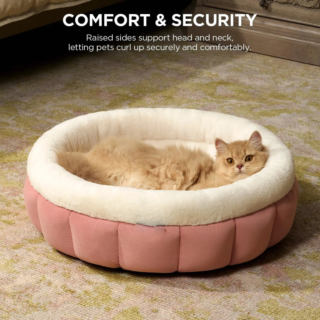 Round donut dog and cat bed in faux rabbit fur with anti-slip bottom and raised sides, available in five sizes