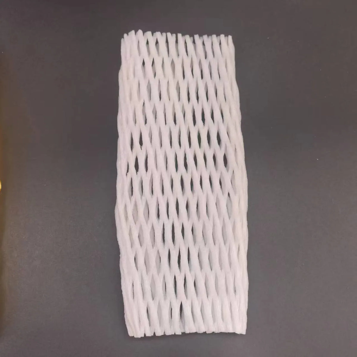White foam net sleeve for protecting apples pears peaches and citrus fruit from bruising