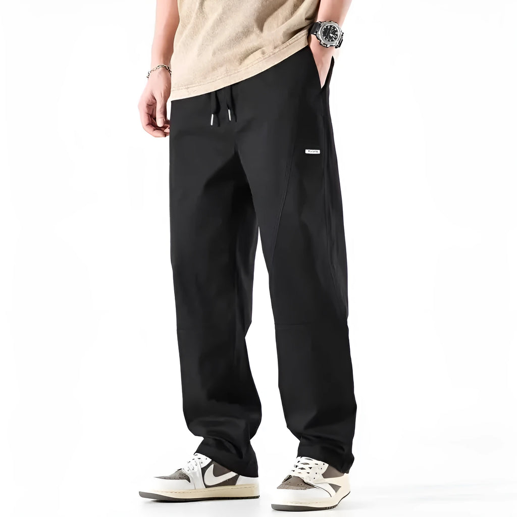 Cotton wide-leg trousers with antibacterial function in milky white and black colours showing pants-mouth design