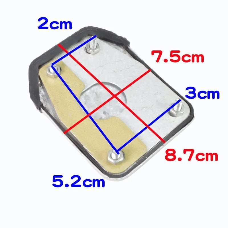 Metal brake pedal skid plate for motorcycle or scooter, shown as a foot-type footplate.