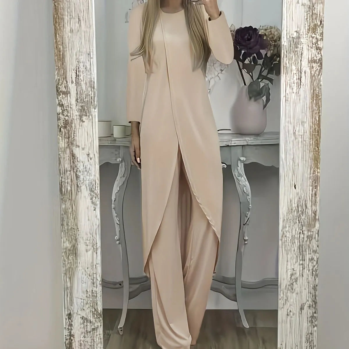 Polyester two-piece lounge set with long sleeves and loose trousers in black