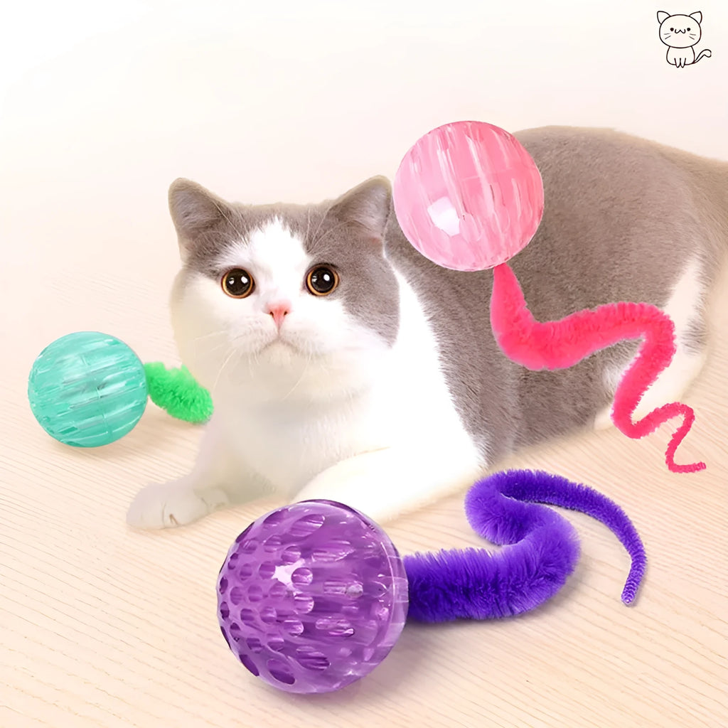 Interactive cat ball toy with bouncy TPR rubber core and removable plush tail, shown in green colour
