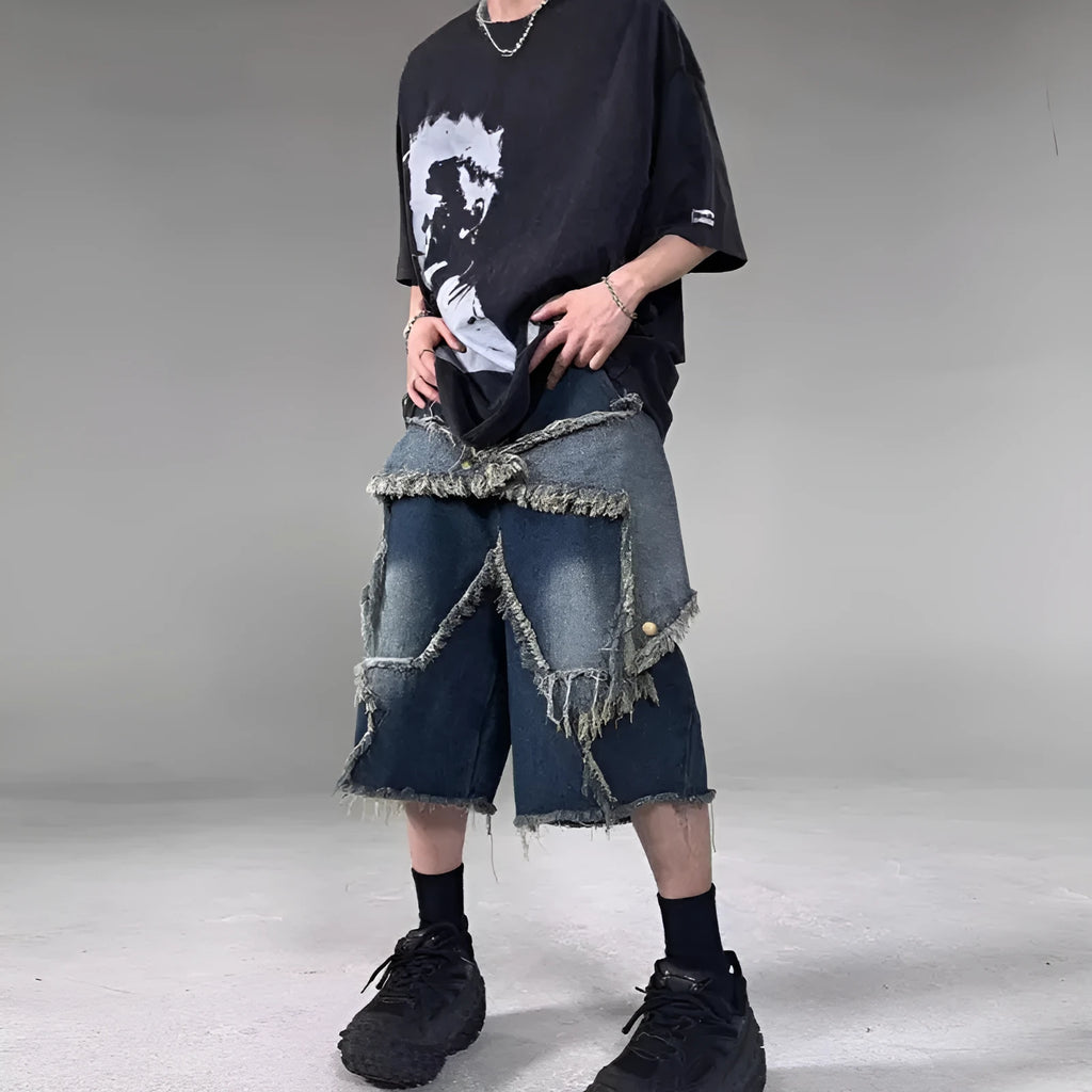 Blue denim shorts with frayed five-pointed star design, loose fit, shown from front view