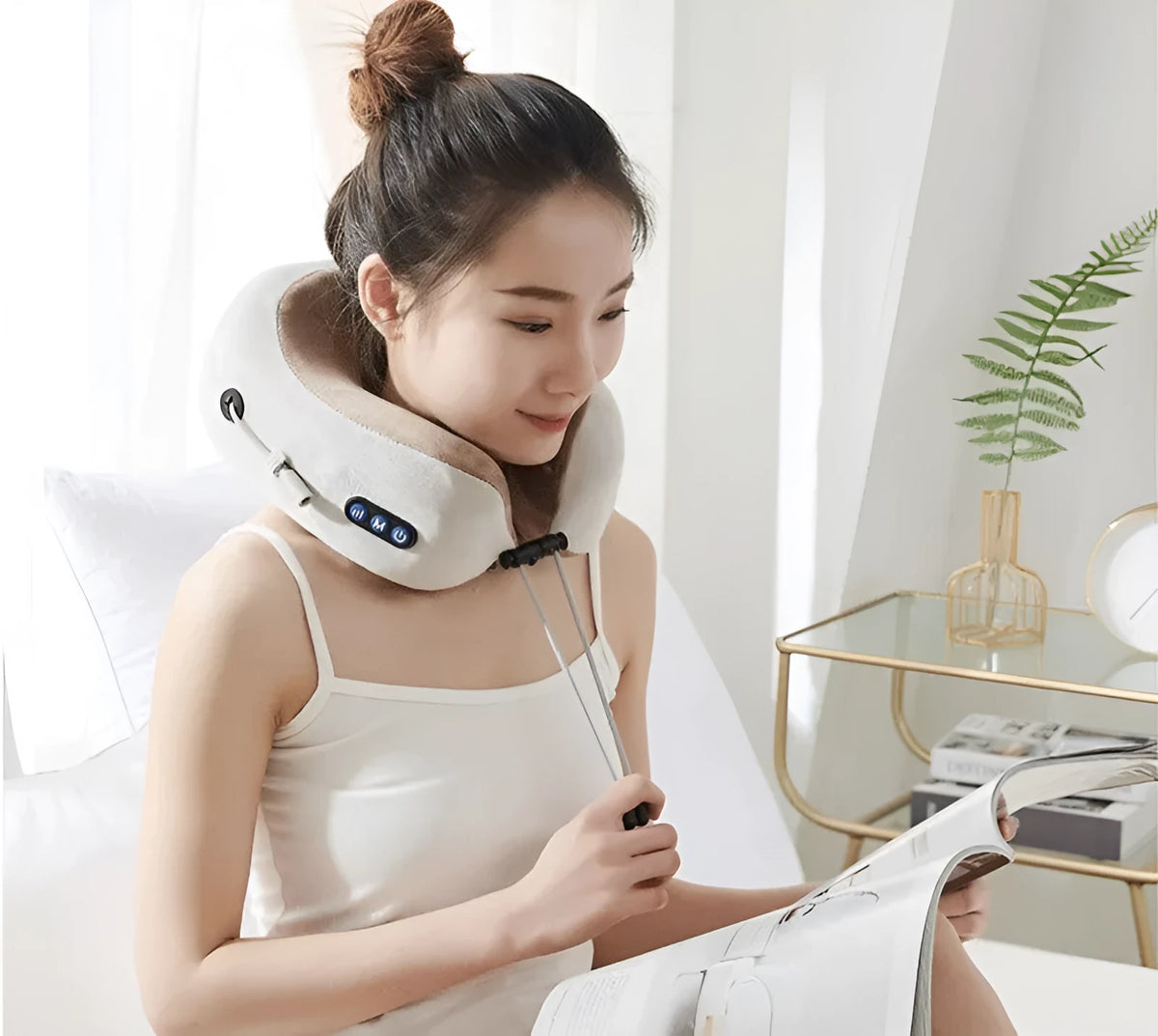 Brown U-shaped electric massage pillow for neck and shoulders with USB charging cable
