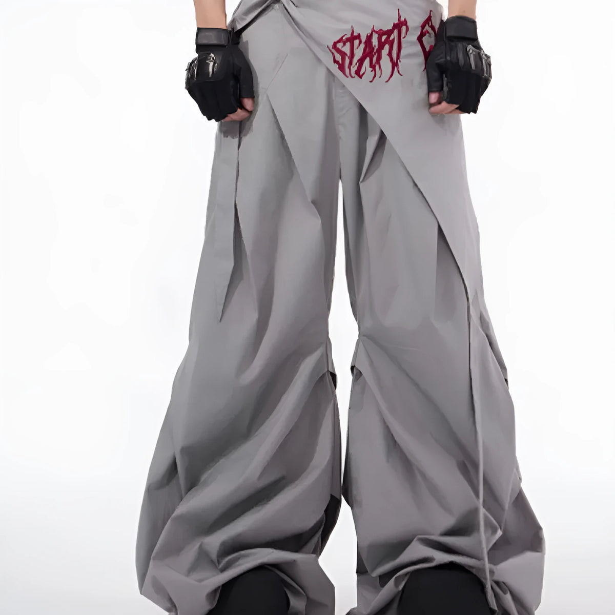 Boys wide-leg Korean style trousers in black and grey colours showing summer functional design