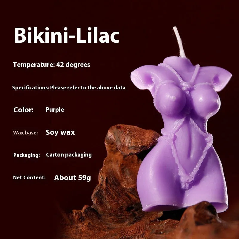 9i Smsexy low-temperature soy wax bikini candle in red, pink, or purple for sensual use.