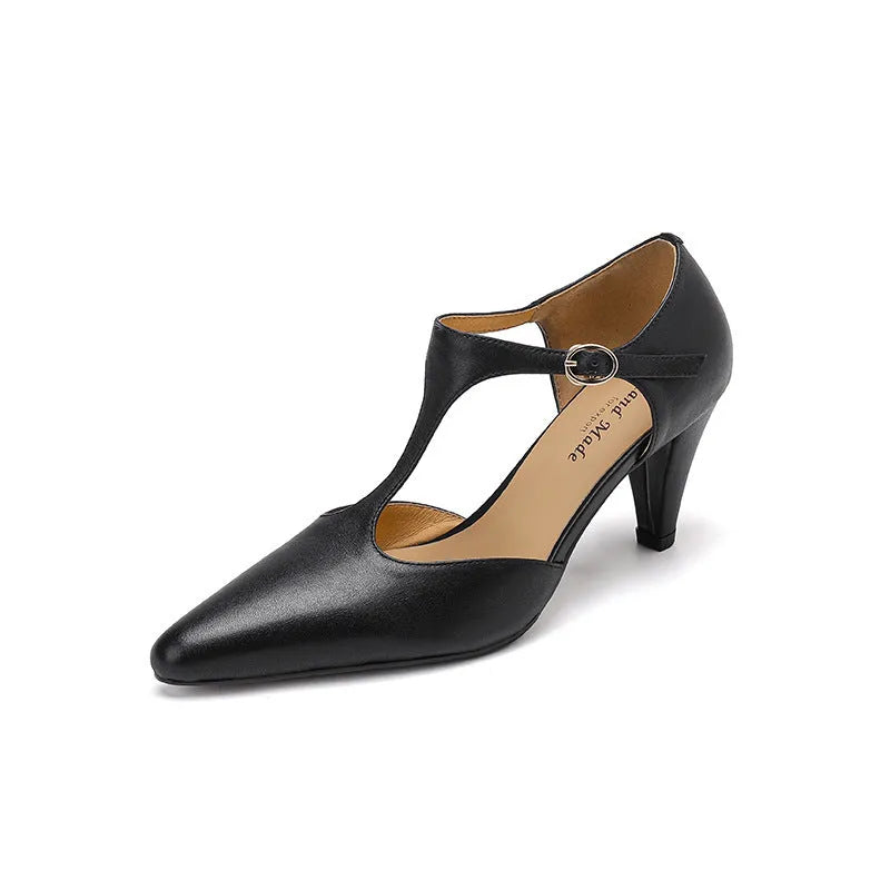 Brown women's retro T-strap sandals with a closed toe, buckle, and a short stout high heel.