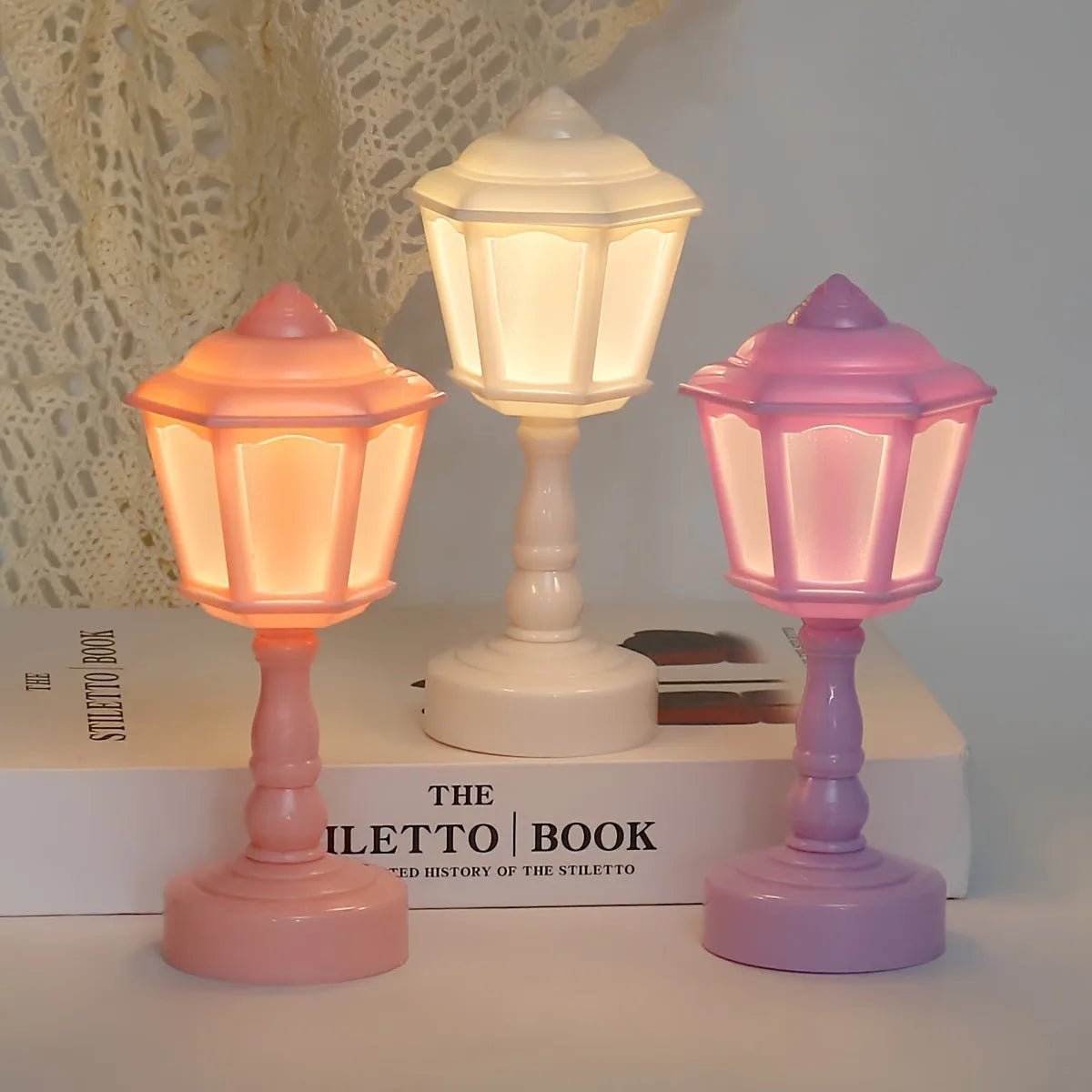 Retro pagoda shaped night lamp with geometric design in light purple colour option