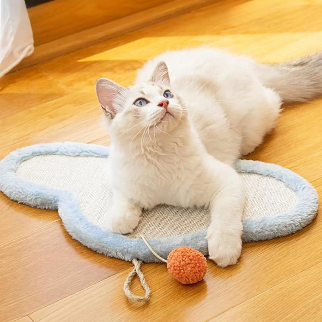 White cat scratching mat with sleeping cat pattern, wall mounted with natural sisal surface