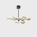 Nordic iron LED chandelier with multiple heads in acrylic detailing hanging from ceiling