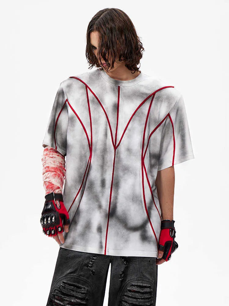 Women's short sleeve t-shirt with padded shoulders and three-dimensional line patchwork design in picture colour
