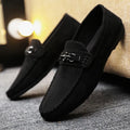 Men's waterproof black and brown slip-on loafers with round toe and low stiletto heel on a rubber sole.