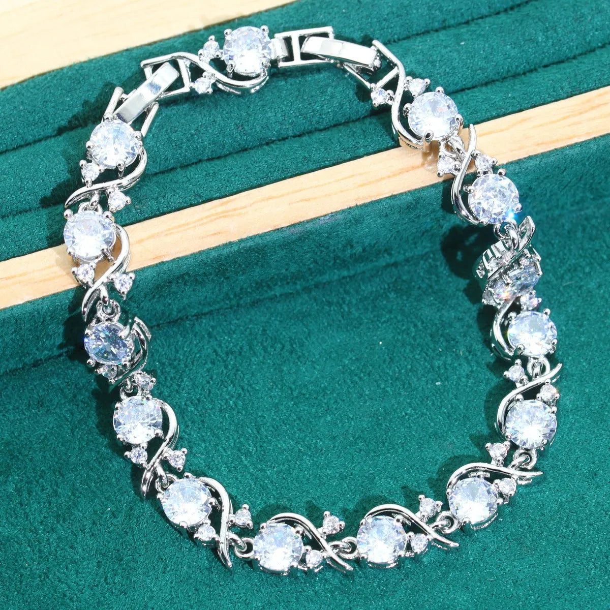 Bridal zircon alloy jewellery four-piece set with necklace, earrings, bracelet and ring in water wave chain design