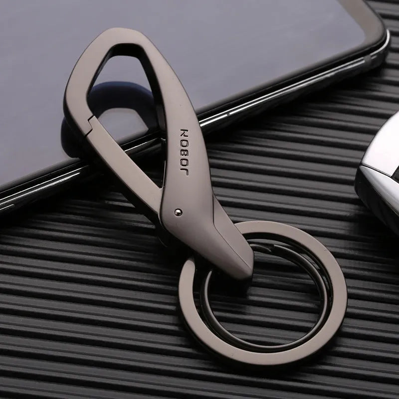 Black zinc alloy double ring keychain for waist hanging, measuring 8.3 by 3.5 centimetres.