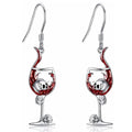 A pair of zinc alloy Halloween earrings with a skull and wine glass design.